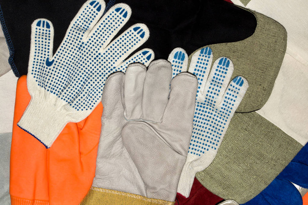 Working gloves and mittens in assortment. - Photo, Image