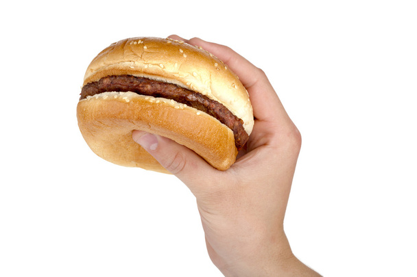 a hand holding hamburger - Φωτογραφία, εικόνα