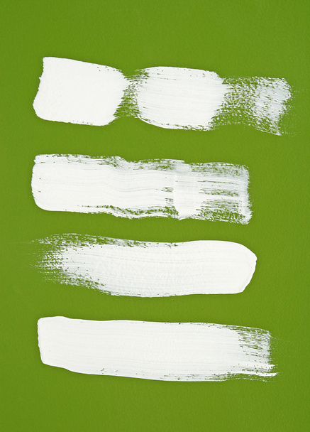 White brush strokes on green background - Photo, Image