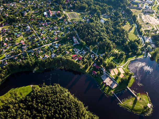 Aerial Drone Photography of the City with the Lake and Stadium Surrounded in Beautiful Spring Colors on a Sunny Day - Fotoğraf, Görsel