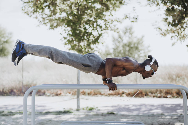 A male athlete training outdoors. - Photo, Image