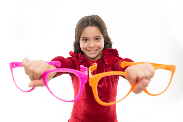 This is for you. Fashion girl with funky glasses. Adorable girl child in fashionable clothes. Little kid with stylish long hair. Happy small child. Fashion look of small model. Little fashionista - Photo, Image