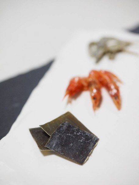 Сушені морепродукти, сушені анчоуси та ламінат, порошок для супу
 - Фото, зображення