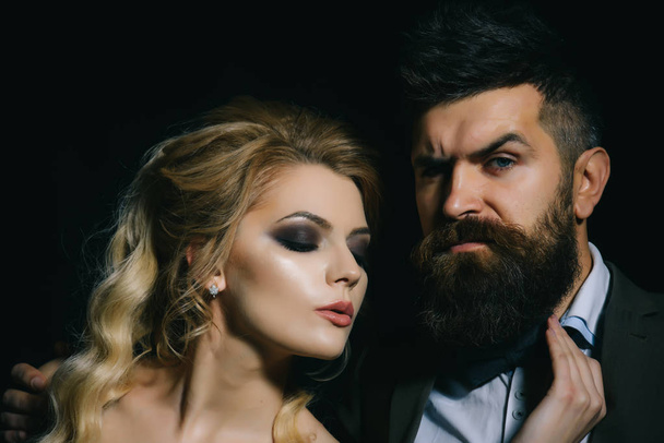 Being in love. Couple of man and woman date on valentines day. Bearded man and sexy woman on first date. Couple in love. Happy valentines day. Going out on first date - Фото, зображення