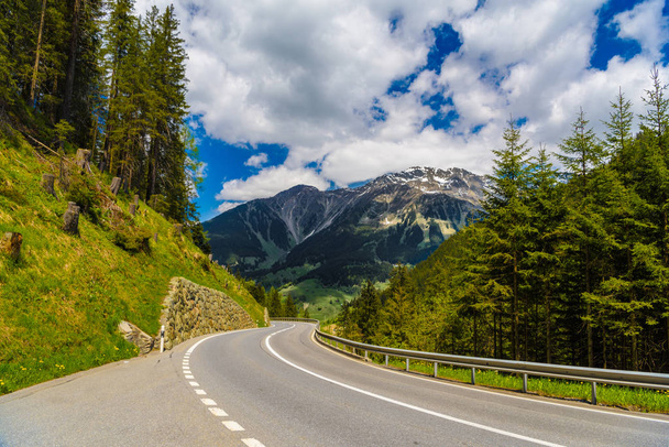 Road among Alps mountains, Klosters-Serneus, Davos,  Graubuenden Switzerland - Photo, image