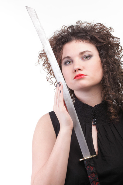 Portrait curly woman curly girl and sword - Foto, Imagem