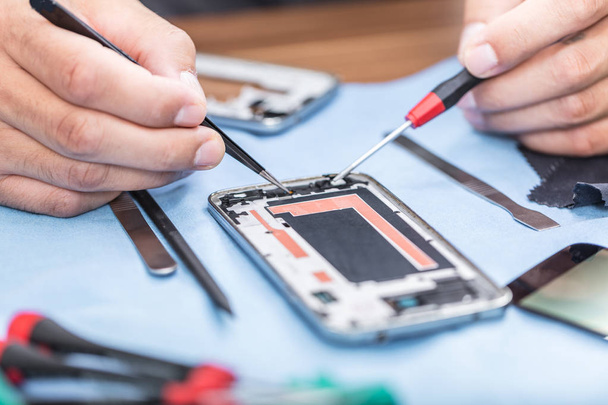 Close-up photos showing process of mobile phone repair - Photo, image