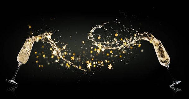 Celebration concept with splashing champagne goblets. New Year and anniversary celebration - Φωτογραφία, εικόνα