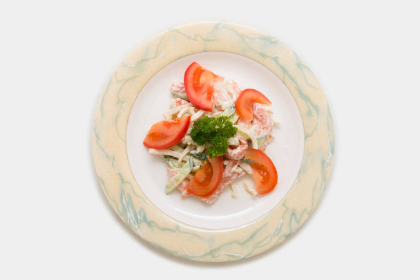 Second dishes, salads and drinks before serving to visitors. Food on the plate. Studio shooting on a light background. - Valokuva, kuva