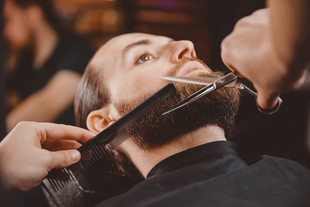 Hipster client man visiting in barber shop - Photo, Image