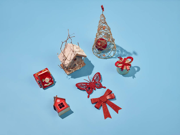 Christmas decoration background over blue background, above view with copy space - Photo, image