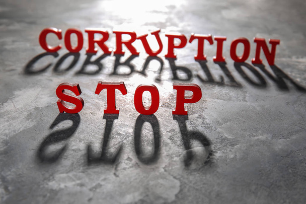 Text stoppen Korruption auf grauem Hintergrund - Foto, Bild