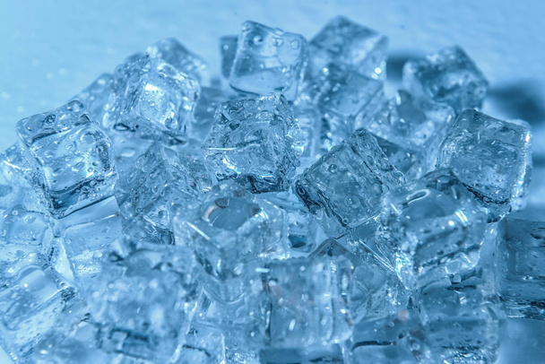 Ice cubes on color background - Photo, Image