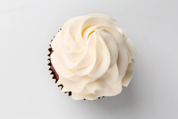 Tasty cupcake on white background - 写真・画像