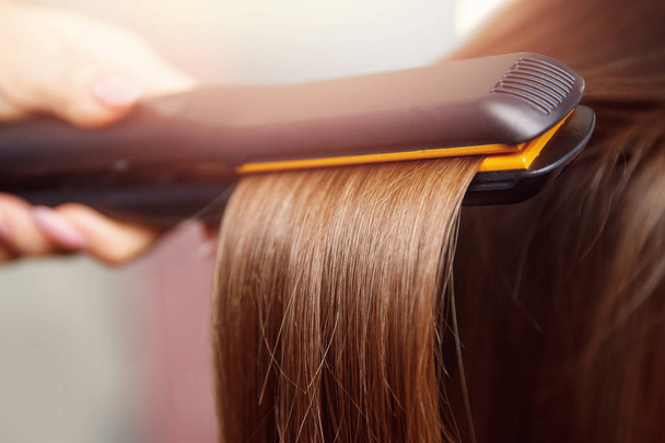 Hair iron straightening beauty care salon - Photo, Image