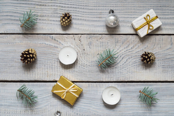 Christmas decorations on a white wooden surface - Valokuva, kuva