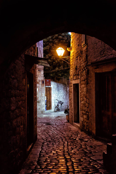 Narrow streets of mediterranean city. Trogir at night. Croatia. - Valokuva, kuva
