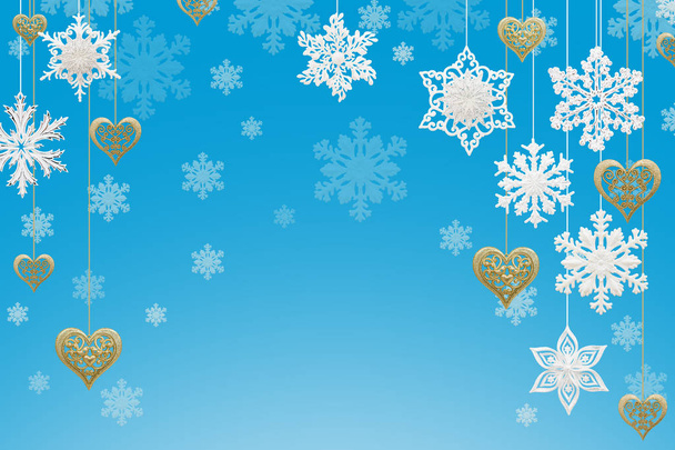 Різдвяні та новорічні прикраси: сніжинки та золоті серця на синьому фоні
. - Фото, зображення