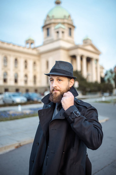 Handsome bearded man with mustache on the street. Movember concept - Fotó, kép