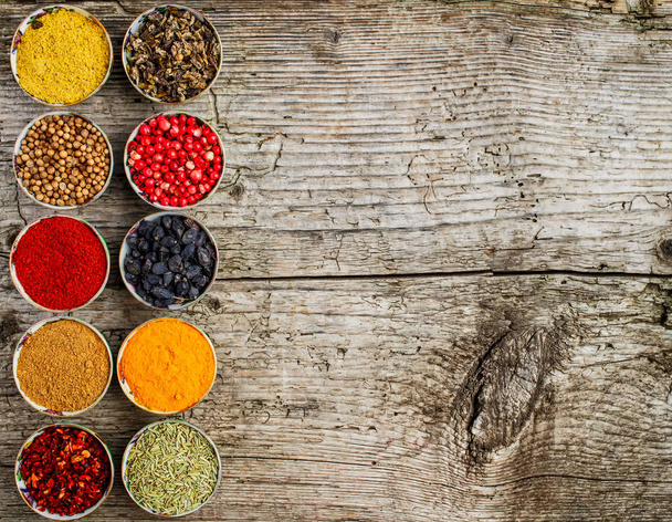 Set of Indian spices on wooden table - Top view - Фото, изображение