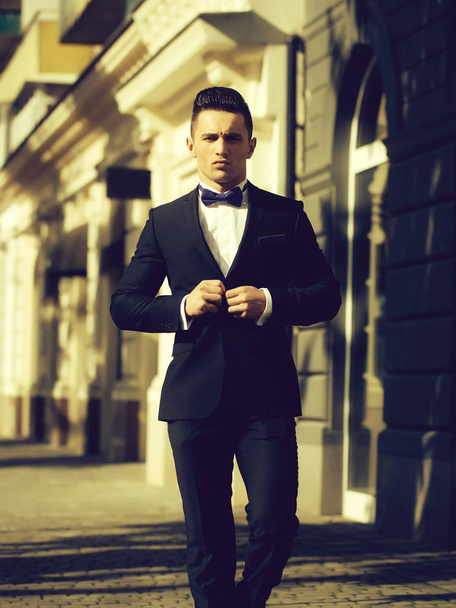 Young man in suit  - Fotografie, Obrázek