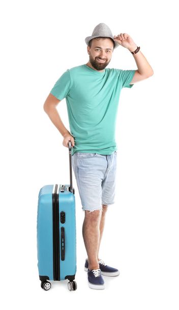 Man with suitcase on white background. Vacation travel - Foto, Imagem