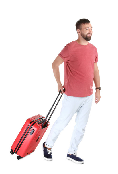 Man with suitcase on white background. Vacation travel - Φωτογραφία, εικόνα
