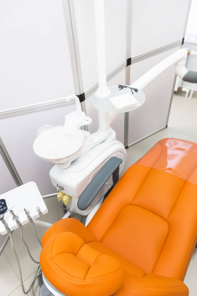 Dental clinic. Reception, examination of the patient. Teeth care. Modern interior of the dental clinic - Photo, image