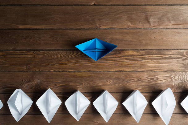 Set of origami boats on wooden table - Fotoğraf, Görsel