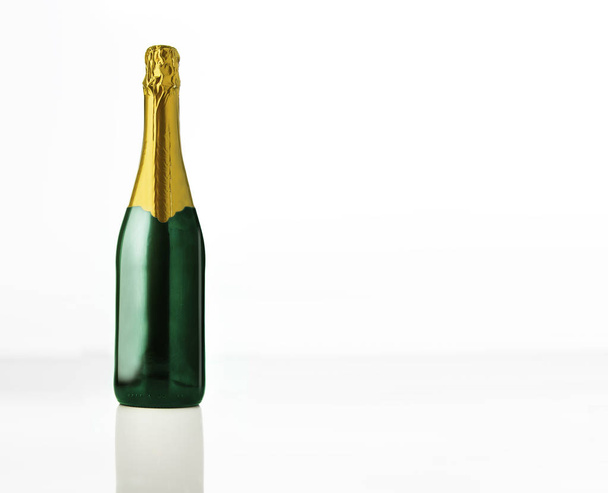 Champagne bottle isolated over white background - Zdjęcie, obraz