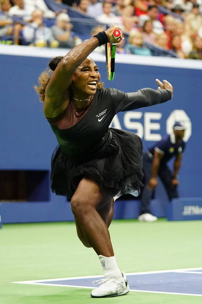 NEW YORK - AUGUST 27, 2018: 23-time Grand Slam champion Serena Williams in action during her 2018 US Open first round match at Billie Jean King National Tennis Center - Photo, Image