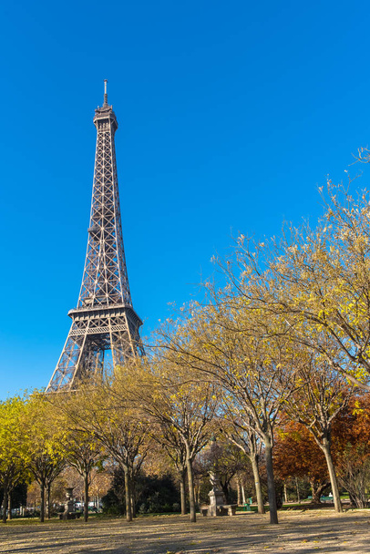     Paris, Eiffel tower in autumn, panorama from the Champ de Mars  - Photo, Image