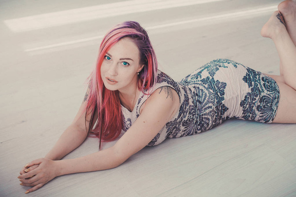 Portrait of a beautiful woman with pink hair - Photo, Image