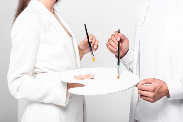 close up of artists in total white with drawing equipment isolated on white - Photo, Image