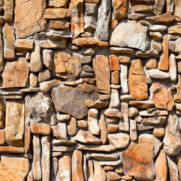 Επένδυση τοίχων με μια συντριμμένη πέτρα. Υφή. - Φωτογραφία, εικόνα