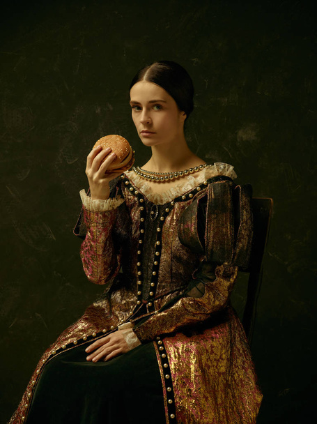 Portrait of a girl wearing a retro princess or countess dress - 写真・画像