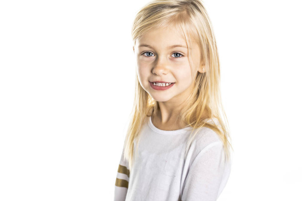 A Cute girl 5 year old posing in studio - Photo, Image