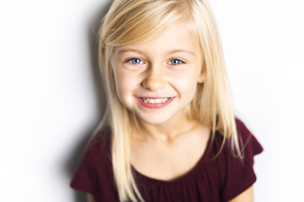 A Cute girl 5 year old posing in studio - Photo, image