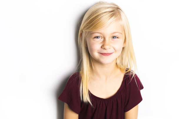 A Cute girl 5 year old posing in studio - Photo, Image