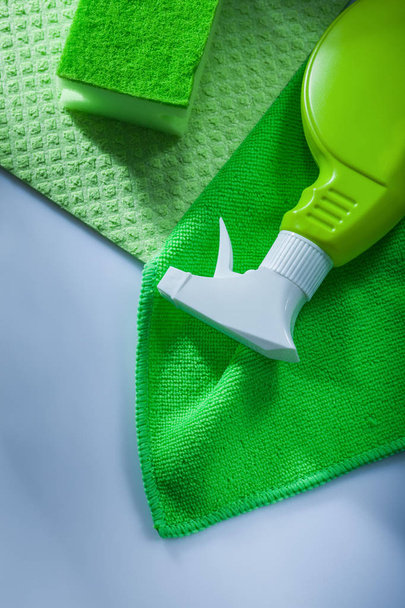 Kitchen dishwashing cloth sprayer sponge on white surface. - Фото, зображення