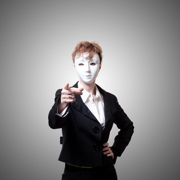 business girl pointing with white mask - Photo, Image