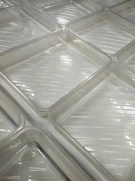 cajas de plástico transparentes extendidas
 - Foto, Imagen