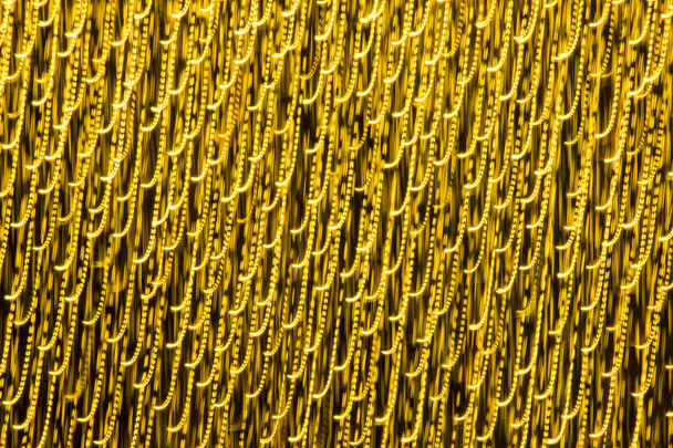 Abstract xmas Gold sparkles or glitter lights. Christmas festive gold background. Defocused bokeh particles. Template for design - Fotografie, Obrázek