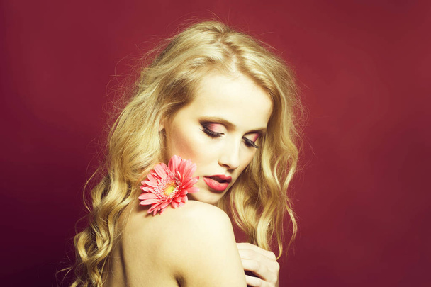 Sexy woman with flower - Foto, afbeelding