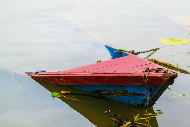 Detail of colourful boat on Phewa lake in Pokhara, the most popular and visited lake of Nepal. - Photo, Image