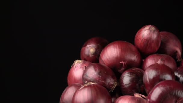 περιστρεφόμενο υπόβαθρο κόκκινα κρεμμύδια - Πλάνα, βίντεο