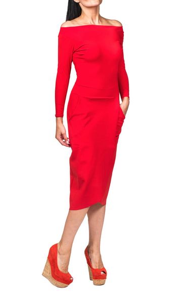 Modelo en vestido corto rojo sobre fondo blanco
 - Foto, Imagen