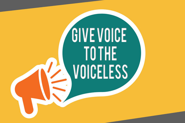 Ecriture conceptuelle montrant Give Voice To The Voiceless. Texte de la photo d'affaires S'exprimer au nom des personnes vulnérables
 - Photo, image