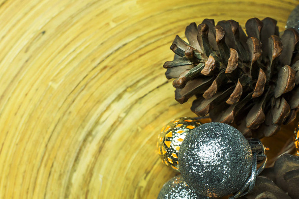 The christmas ball and Pine cones  on wood  background. - Photo, Image