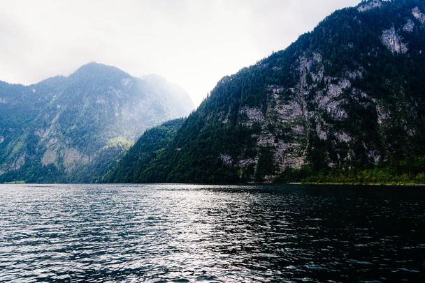 Scenic view of Konigssee in Bavaria a misty day - Foto, immagini